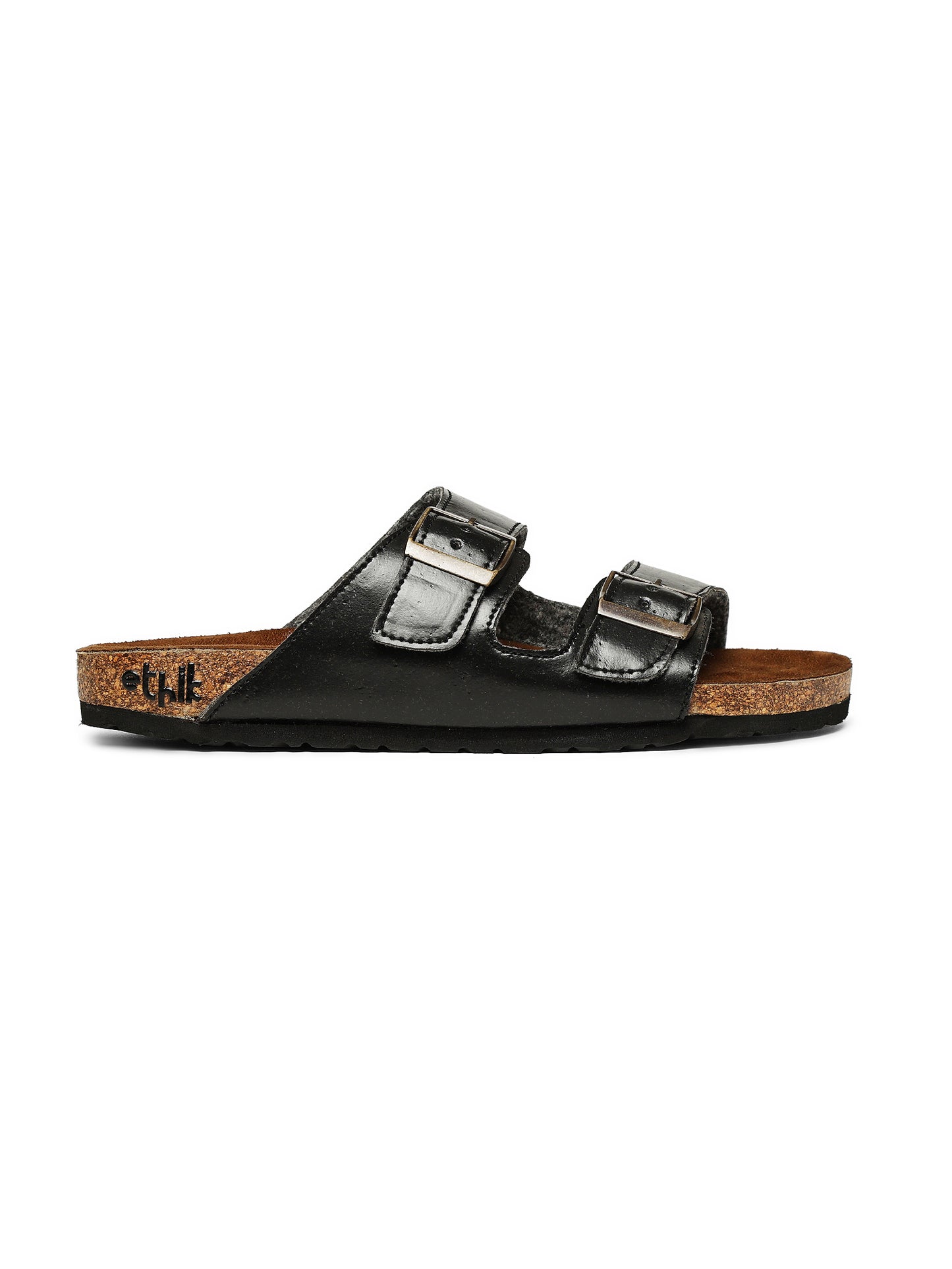 Black sandal with cork sole on a white background