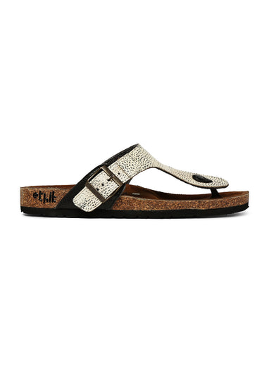 Single sandal with glittery strap on a white background