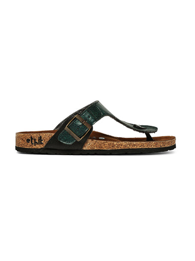 Green sandal with a strap on a white background