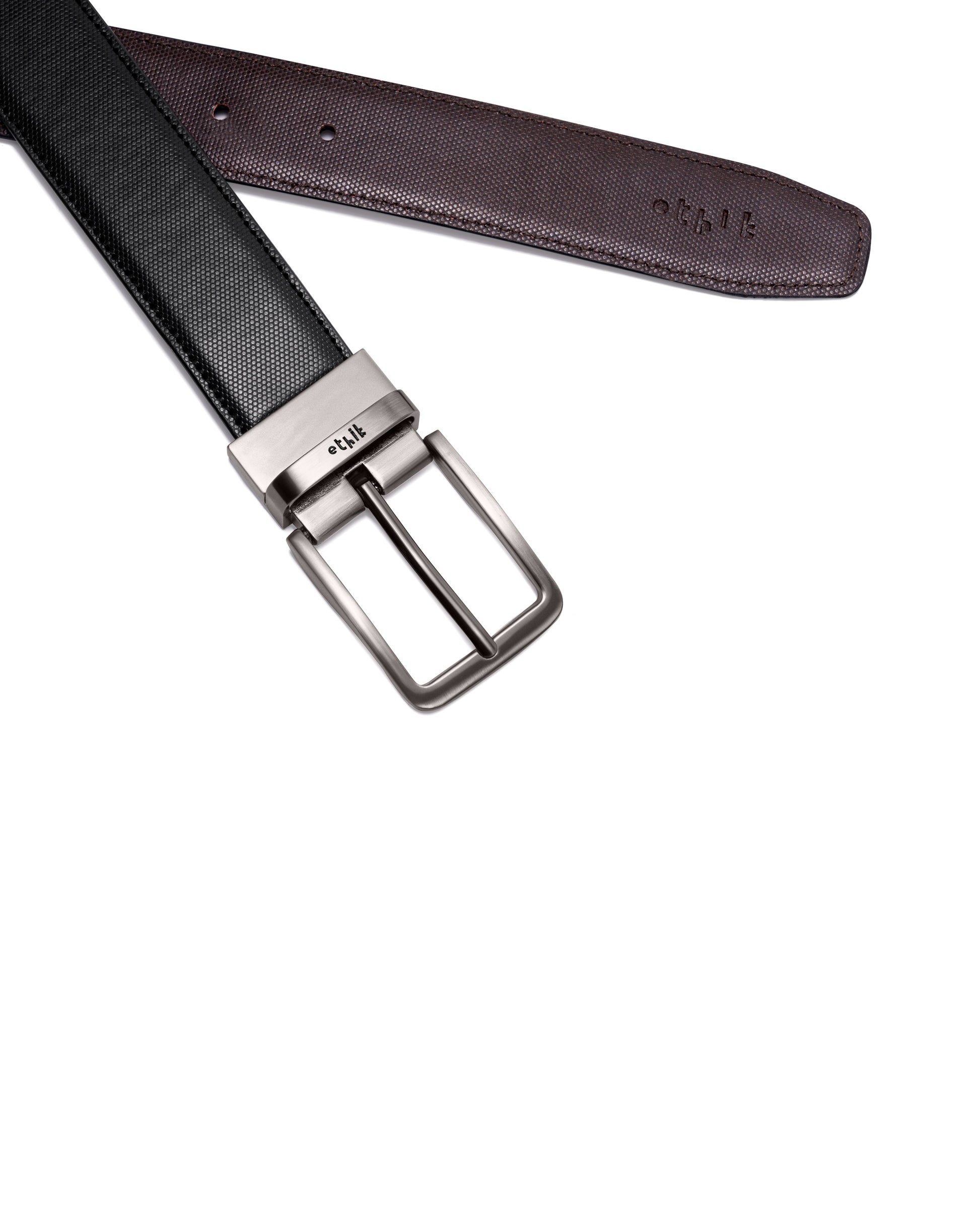 Black belt with silver buckle on a white background
