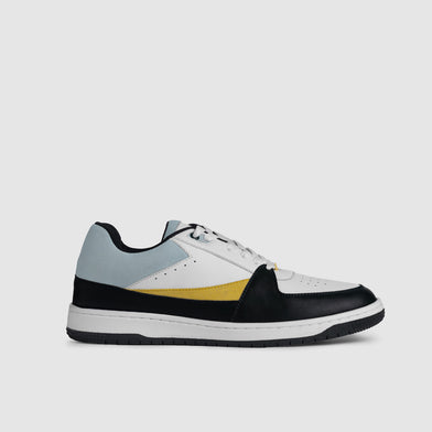 Multicolored sneaker on a light gray background