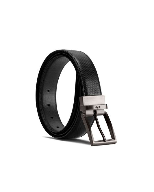 Black belt with silver buckle on a white background