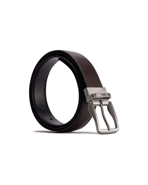 Black belt with silver buckle on a white background