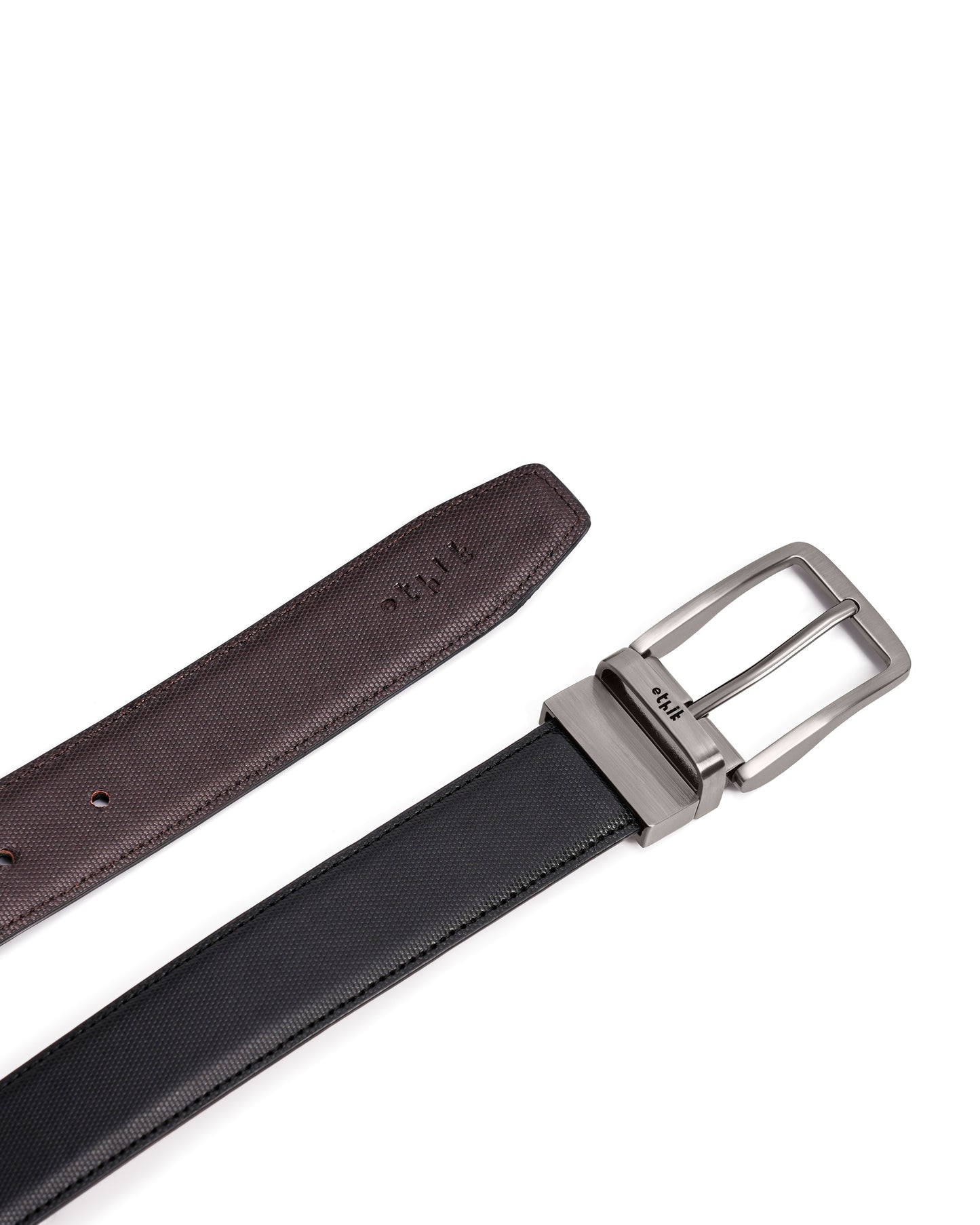 Two belts, one brown and one black, with silver buckles on a white background.