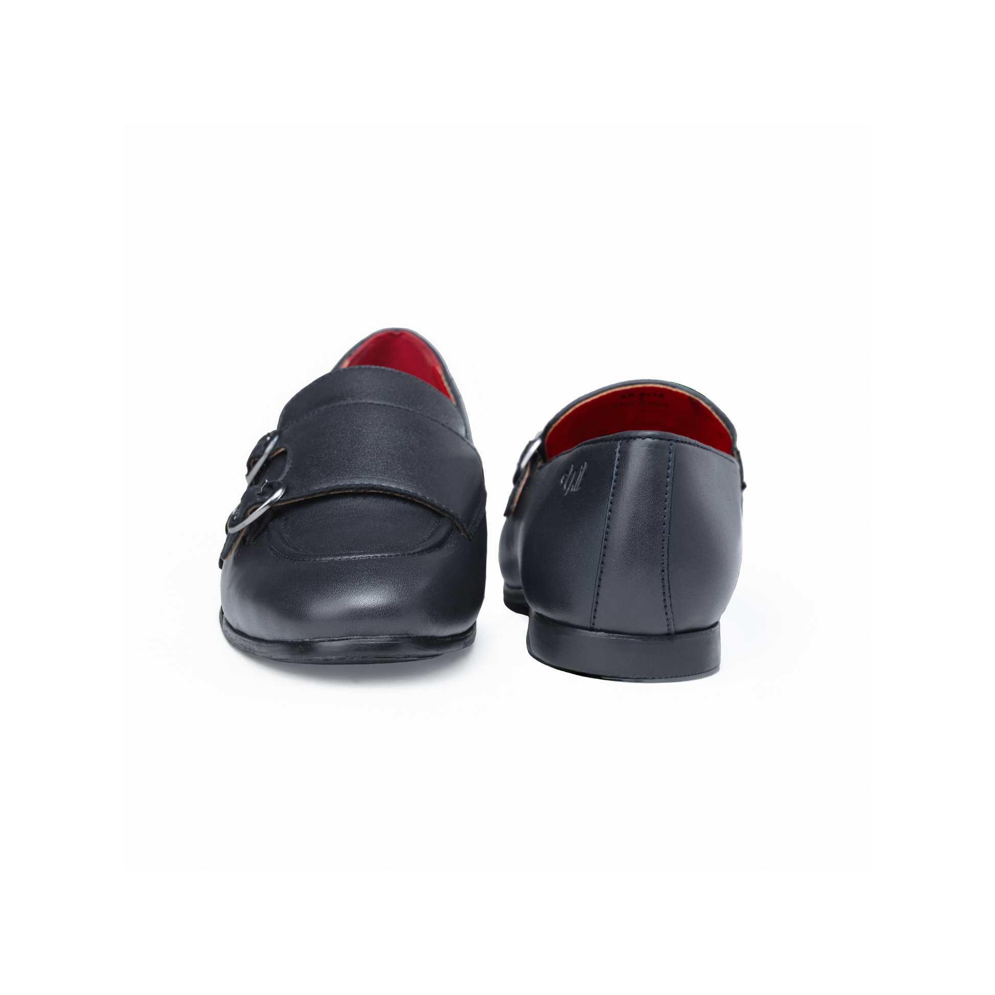 Pair of dark gray loafers with red lining on a white background