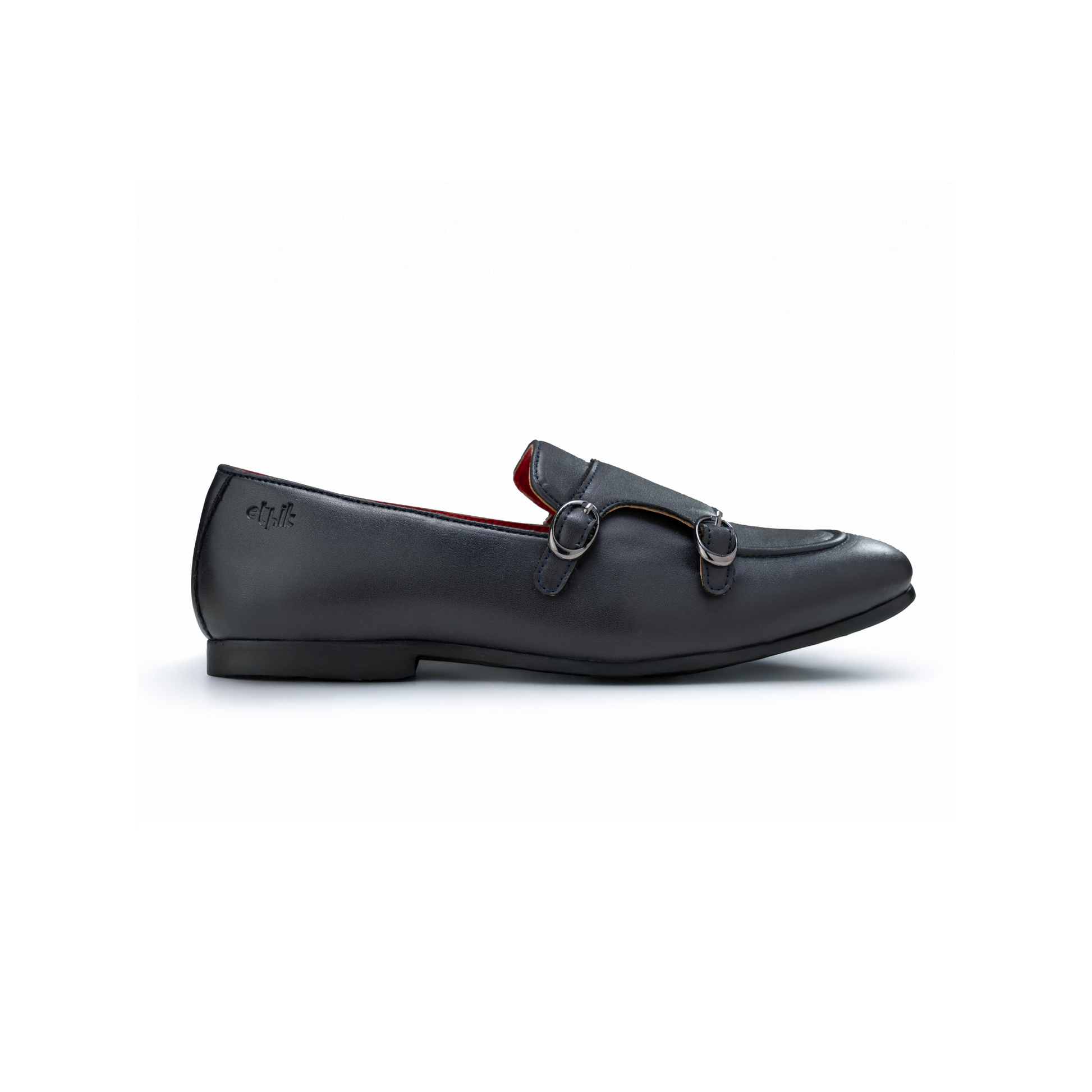 Black loafer shoe with a red interior on a white background