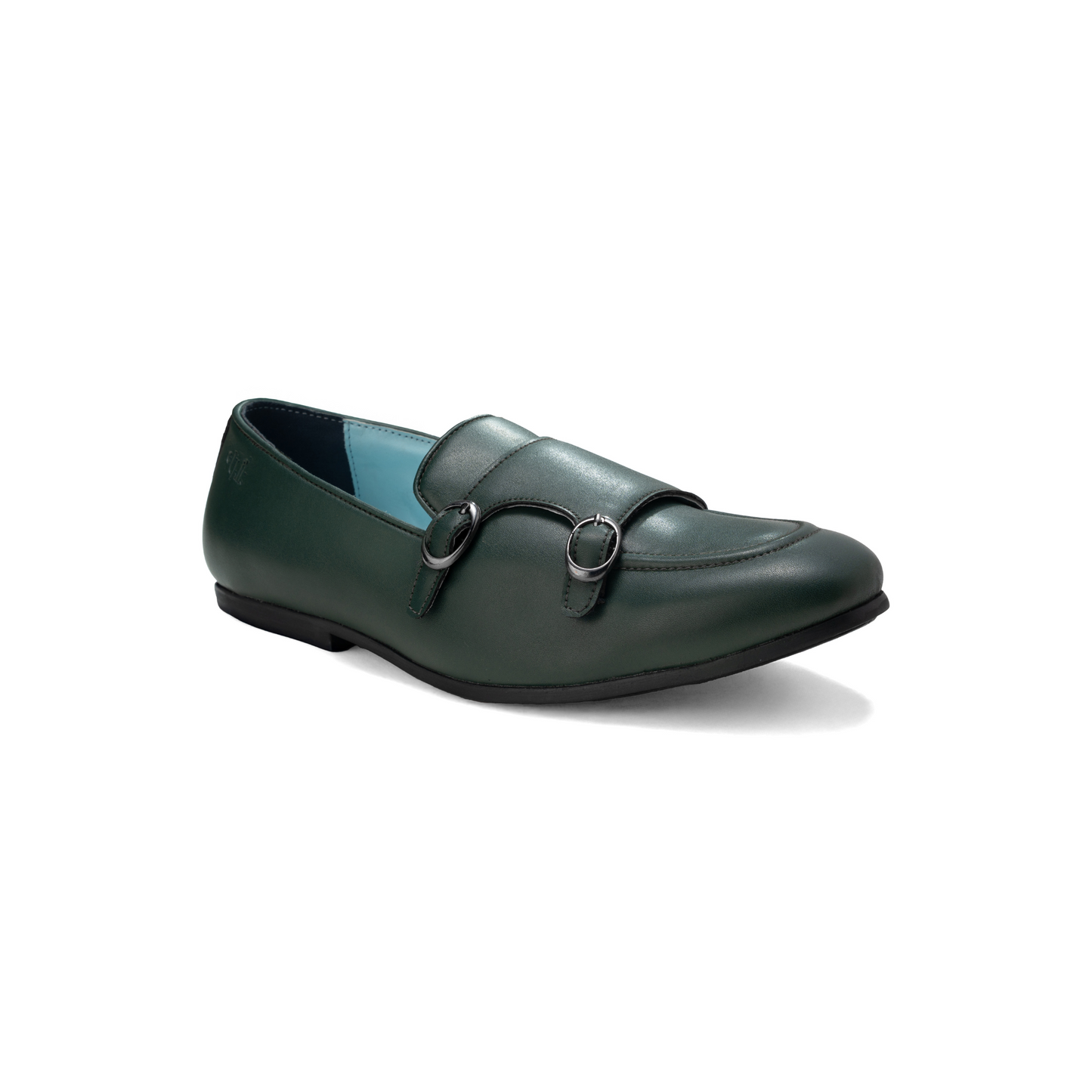Green leather loafer shoe on a white background