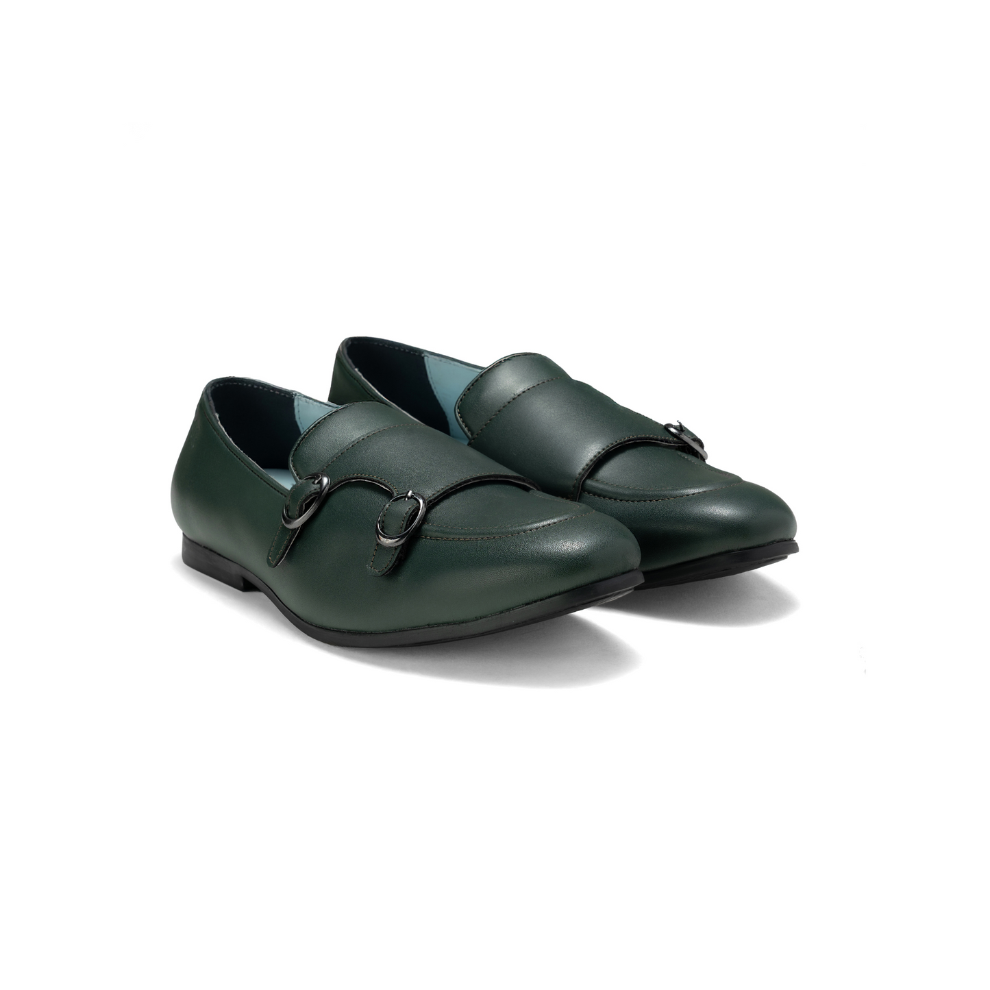 Pair of green loafers on a white background