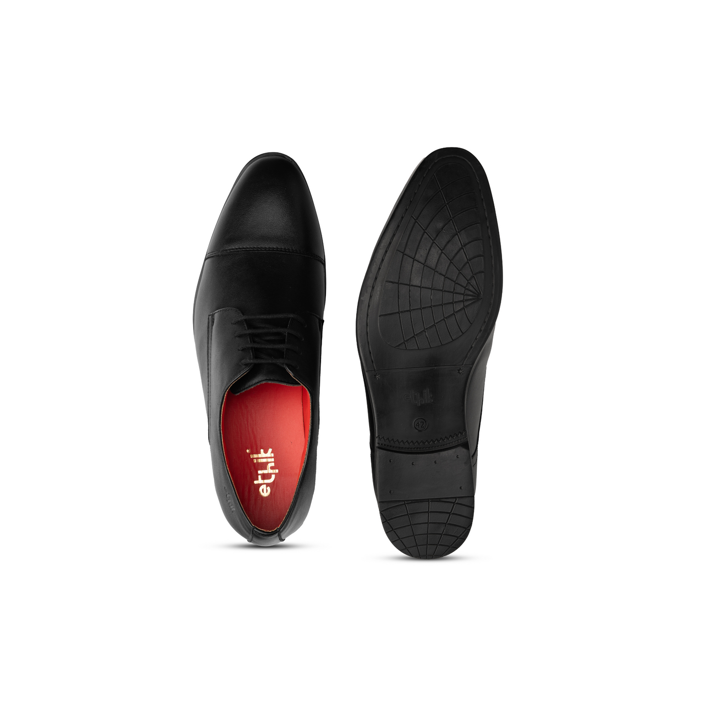 Black dress shoes with red lining on a white background