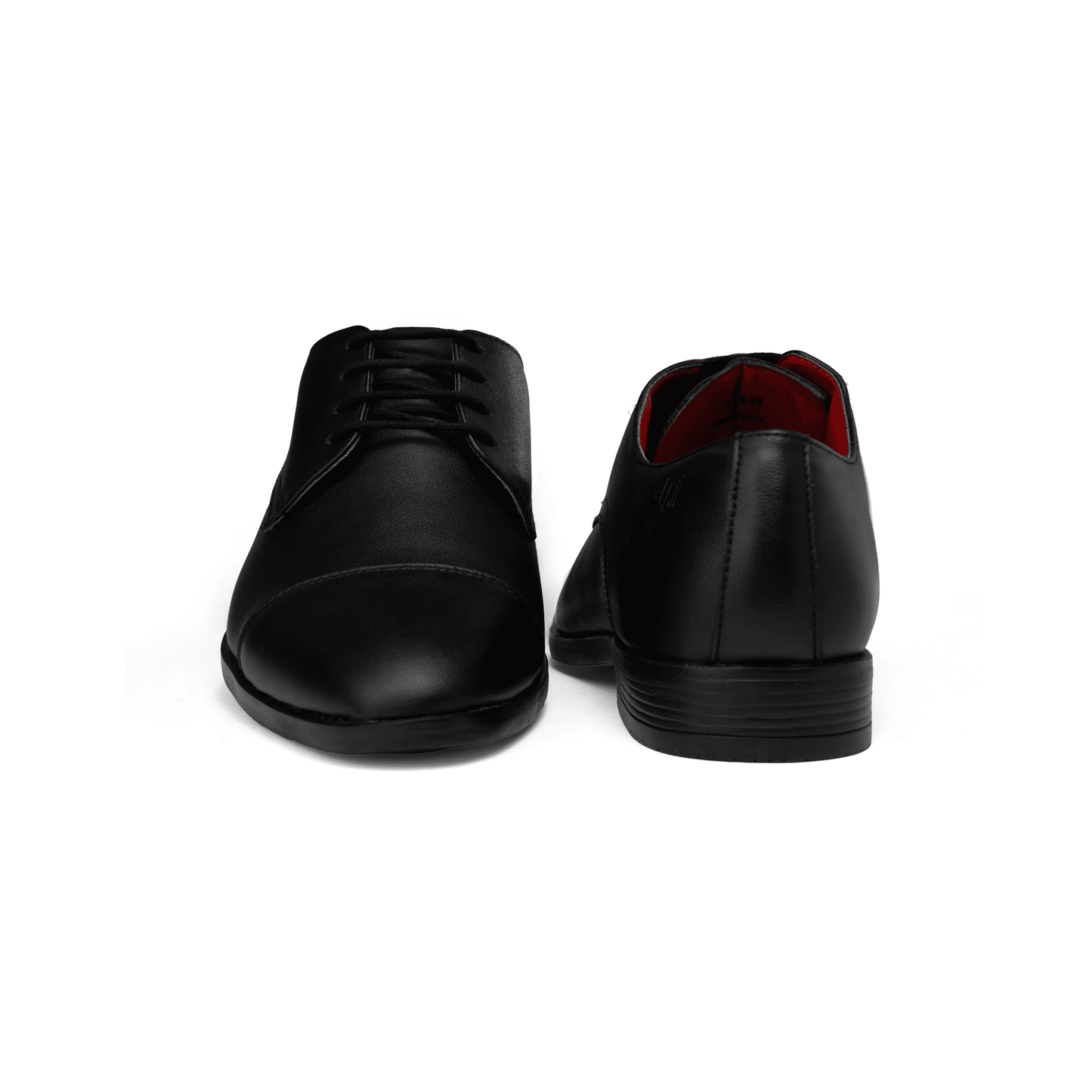 Black leather shoes on a white background
