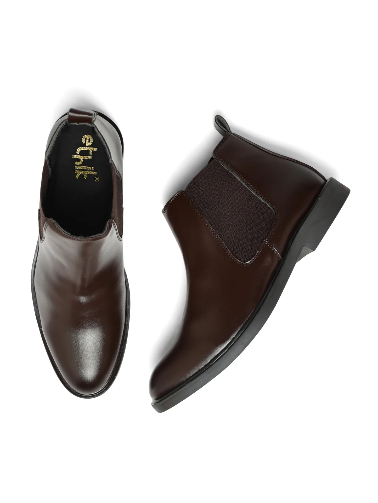 Pair of brown leather boots on a white background