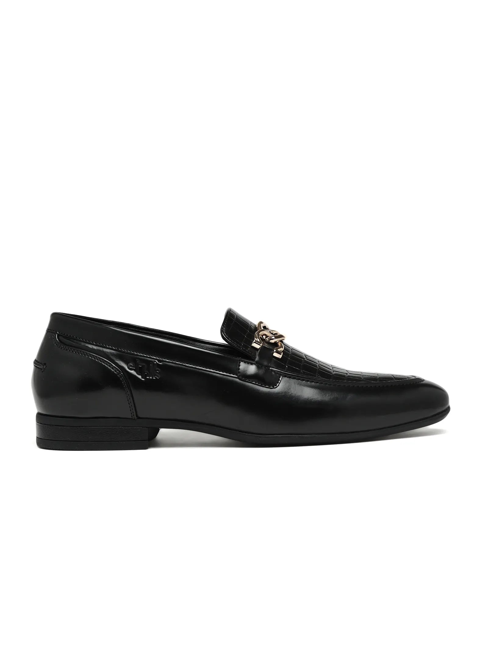Black loafer shoe on a white background