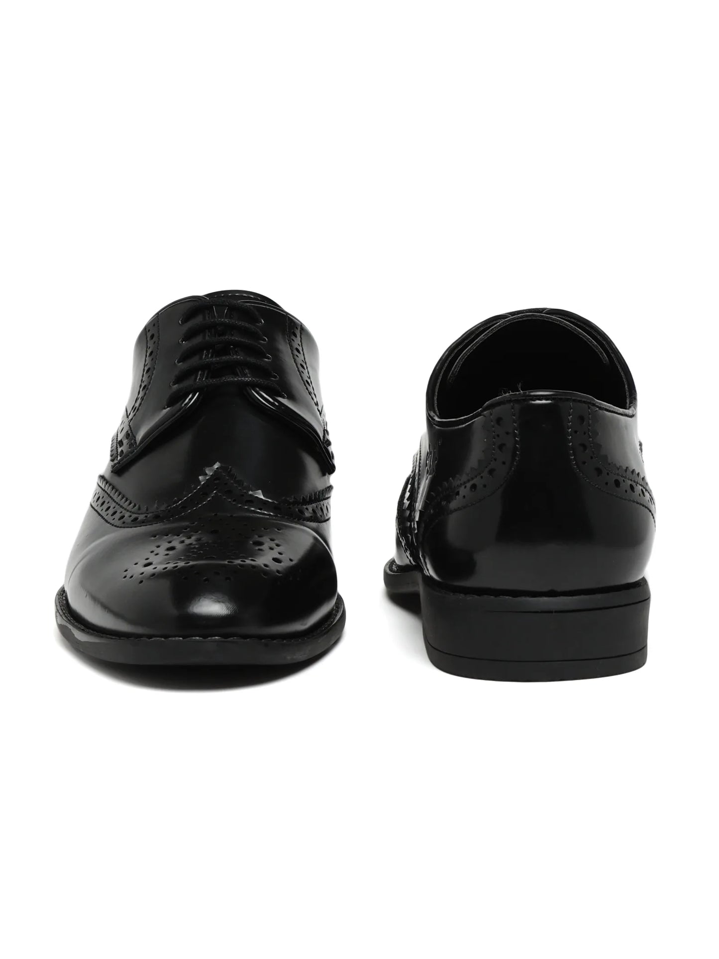 Black dress shoes on a white background
