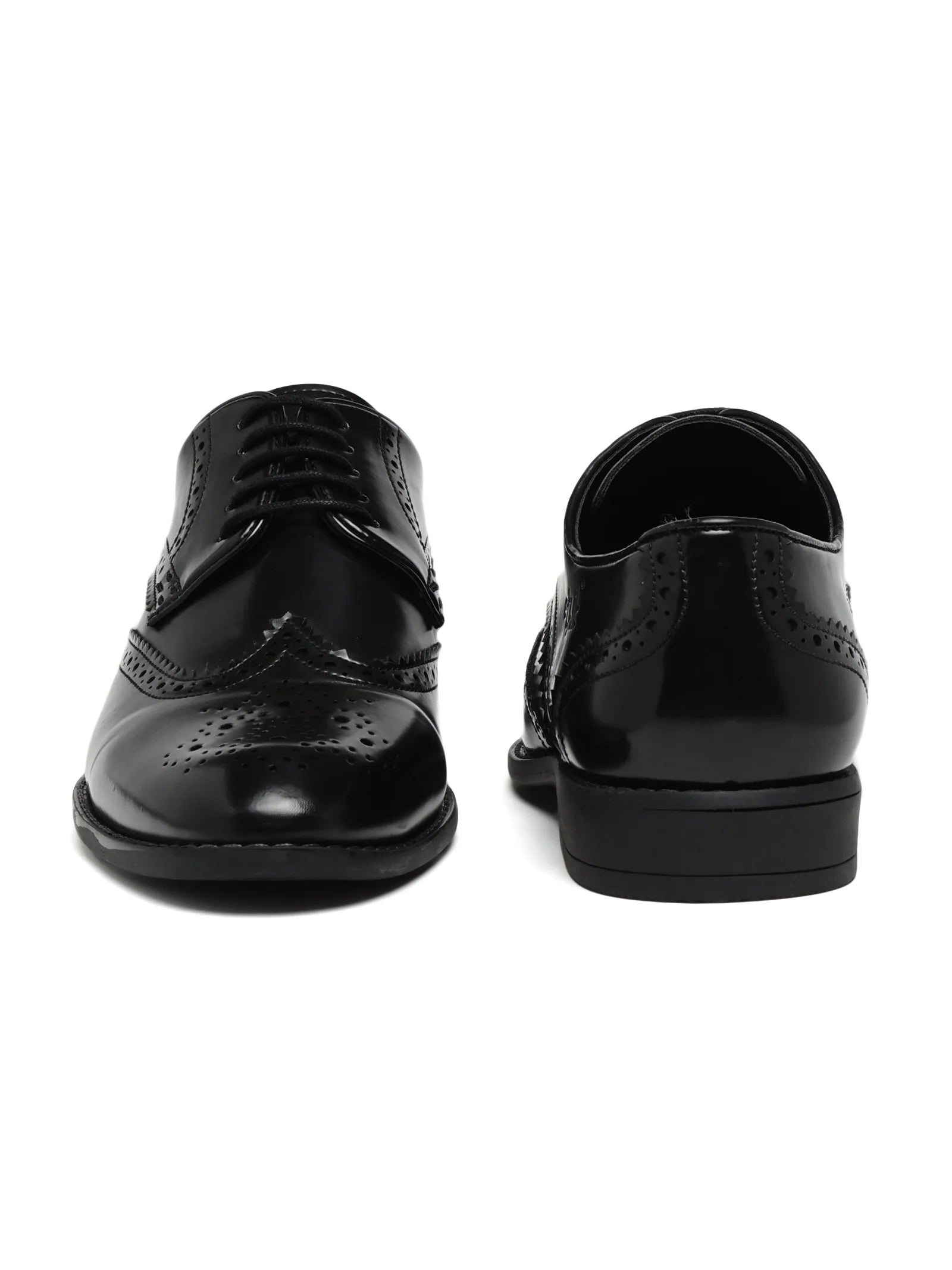 Black dress shoes on a white background