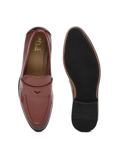 Brown loafer shoe with black sole on a white background