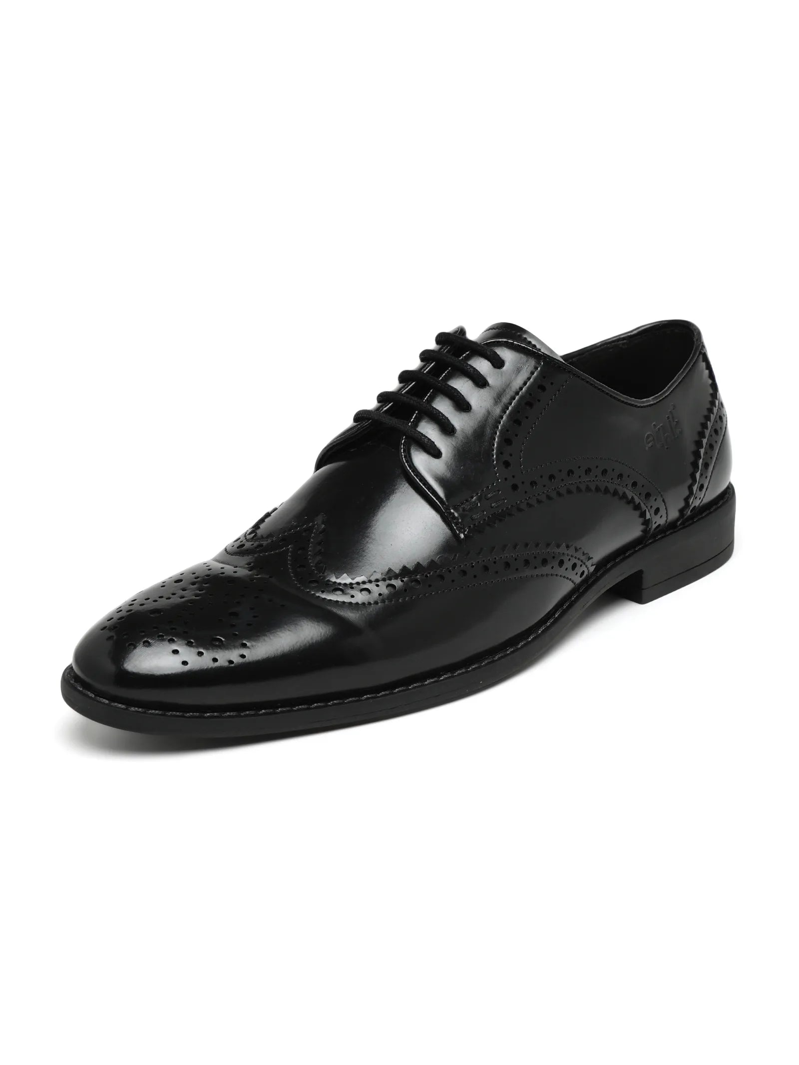 Black leather dress shoe on a white background
