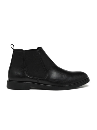 Black leather Chelsea boot on a white background