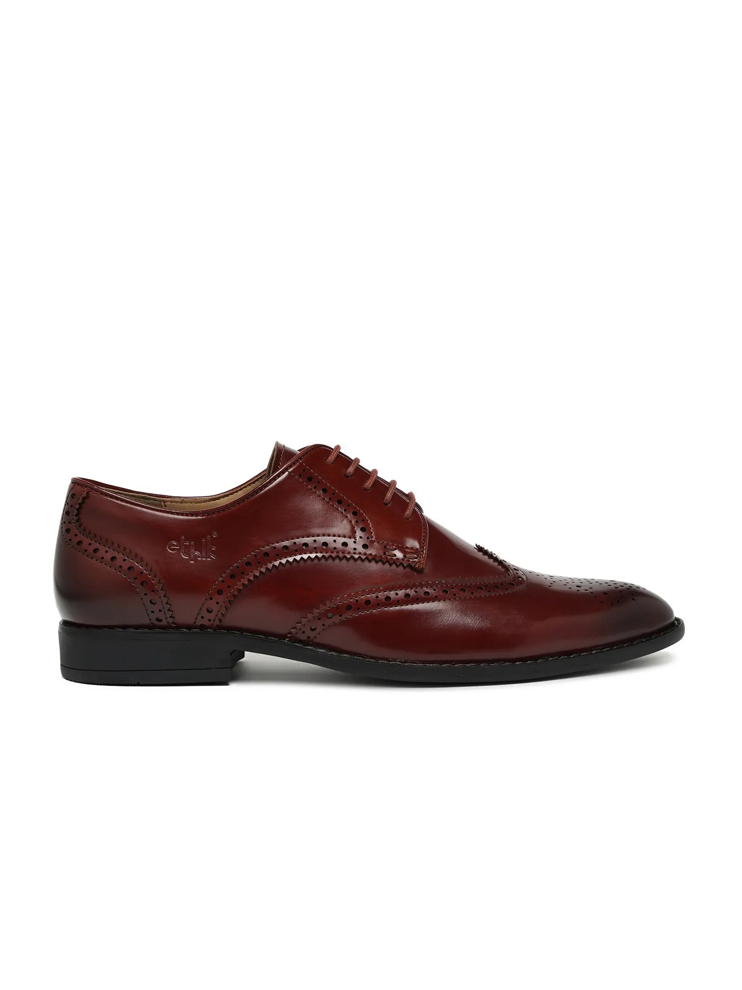Brown leather dress shoe on a white background
