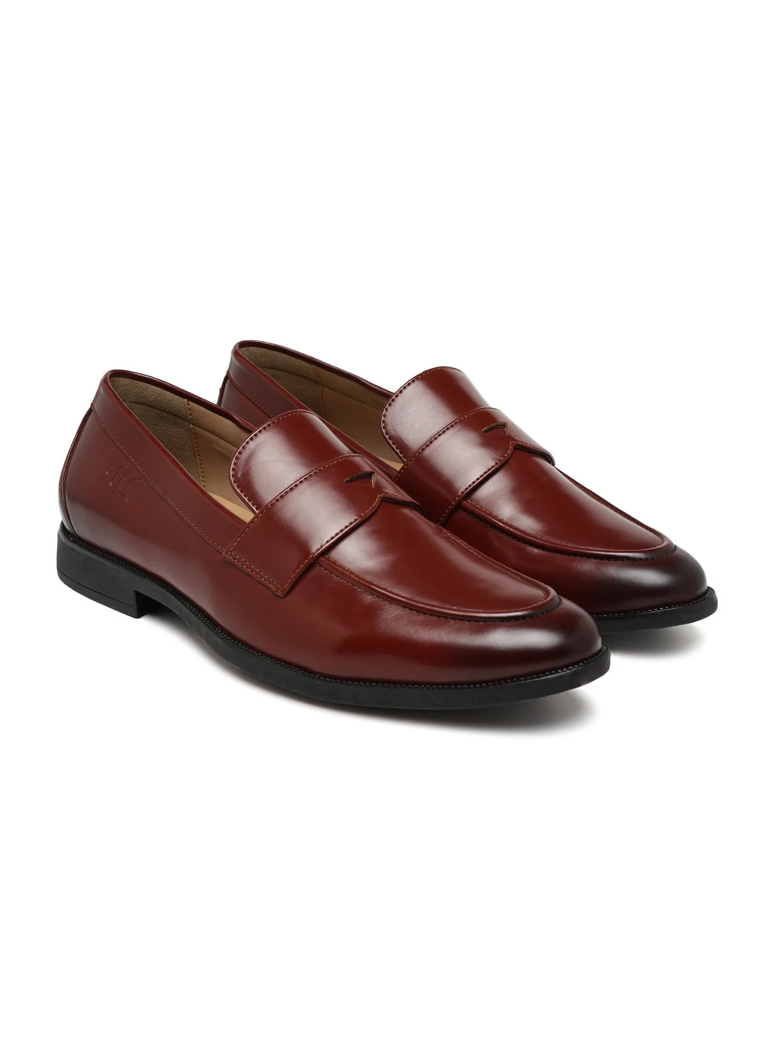 Pair of brown loafers on a white background