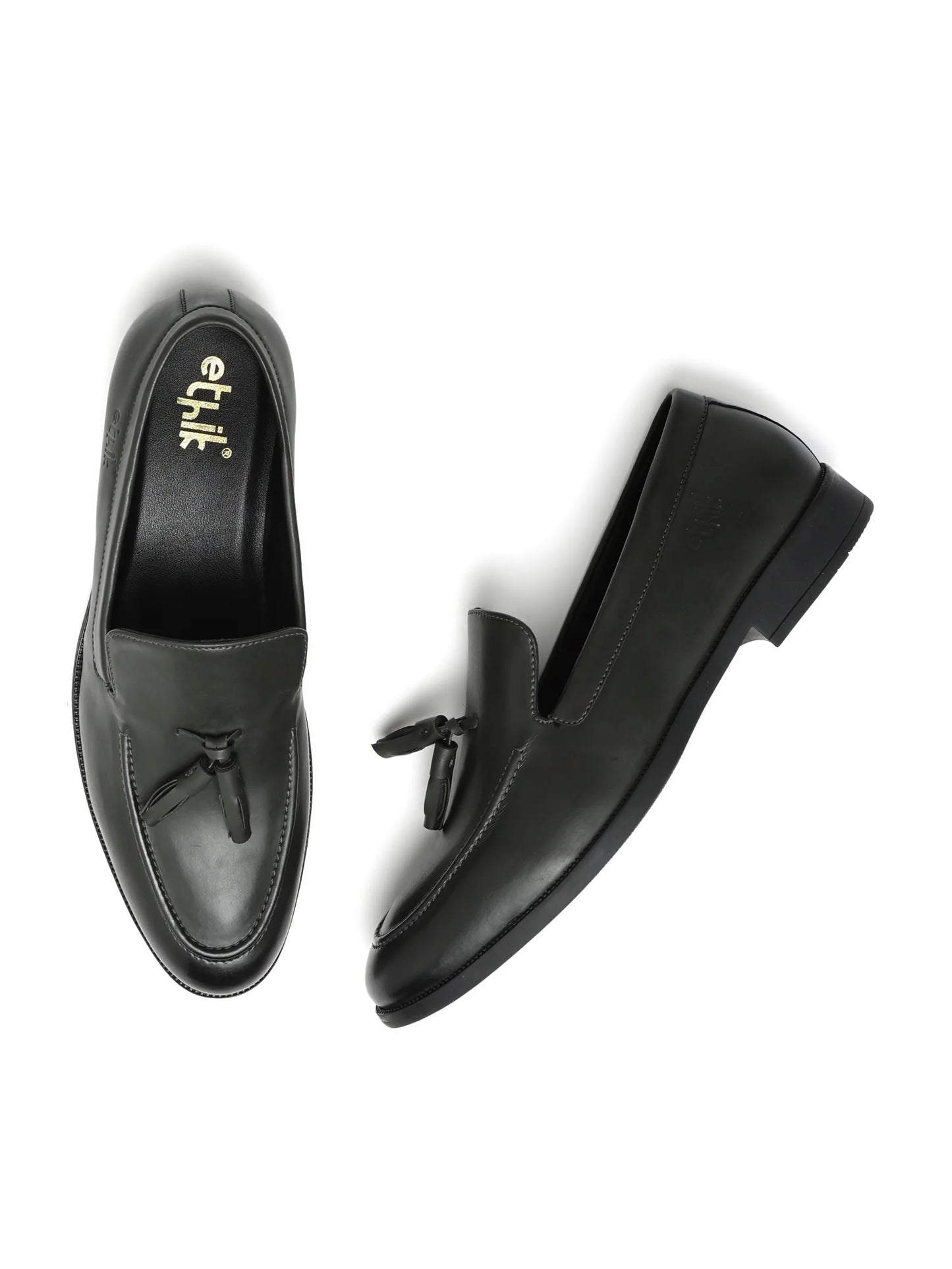 Black loafers with a brand logo on a white background