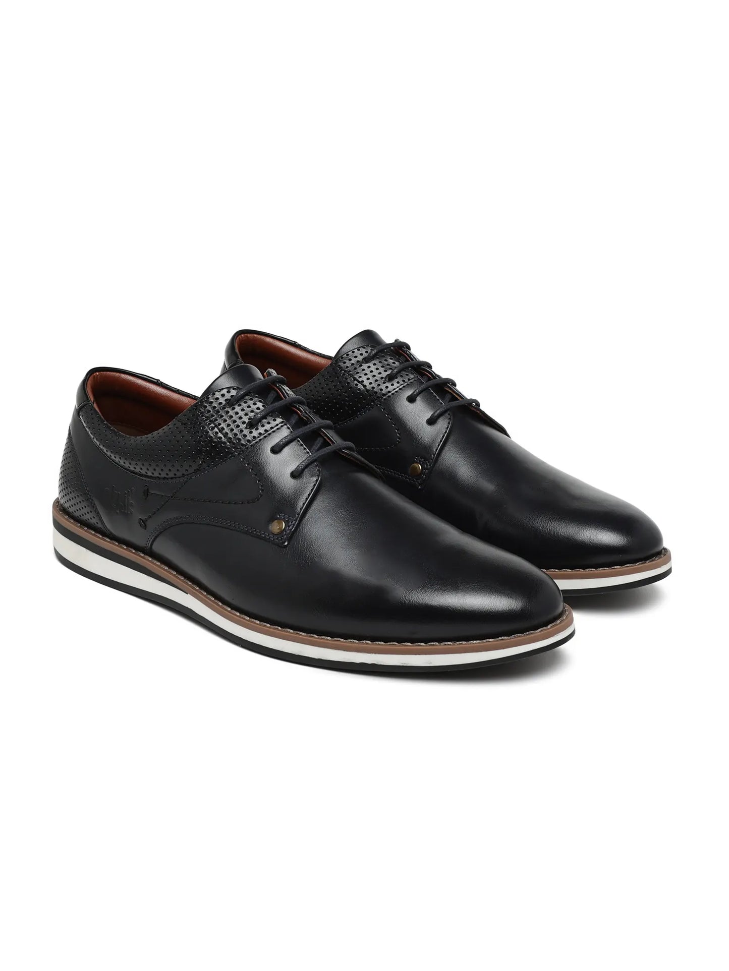 Black leather shoes on a white background