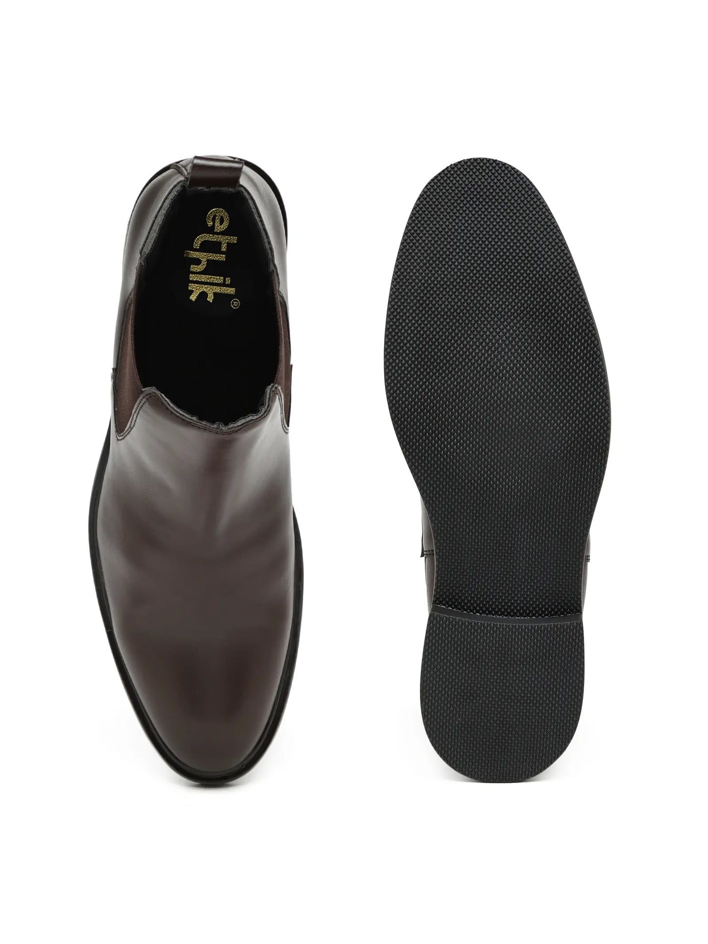 Brown leather shoe with black sole on a white background