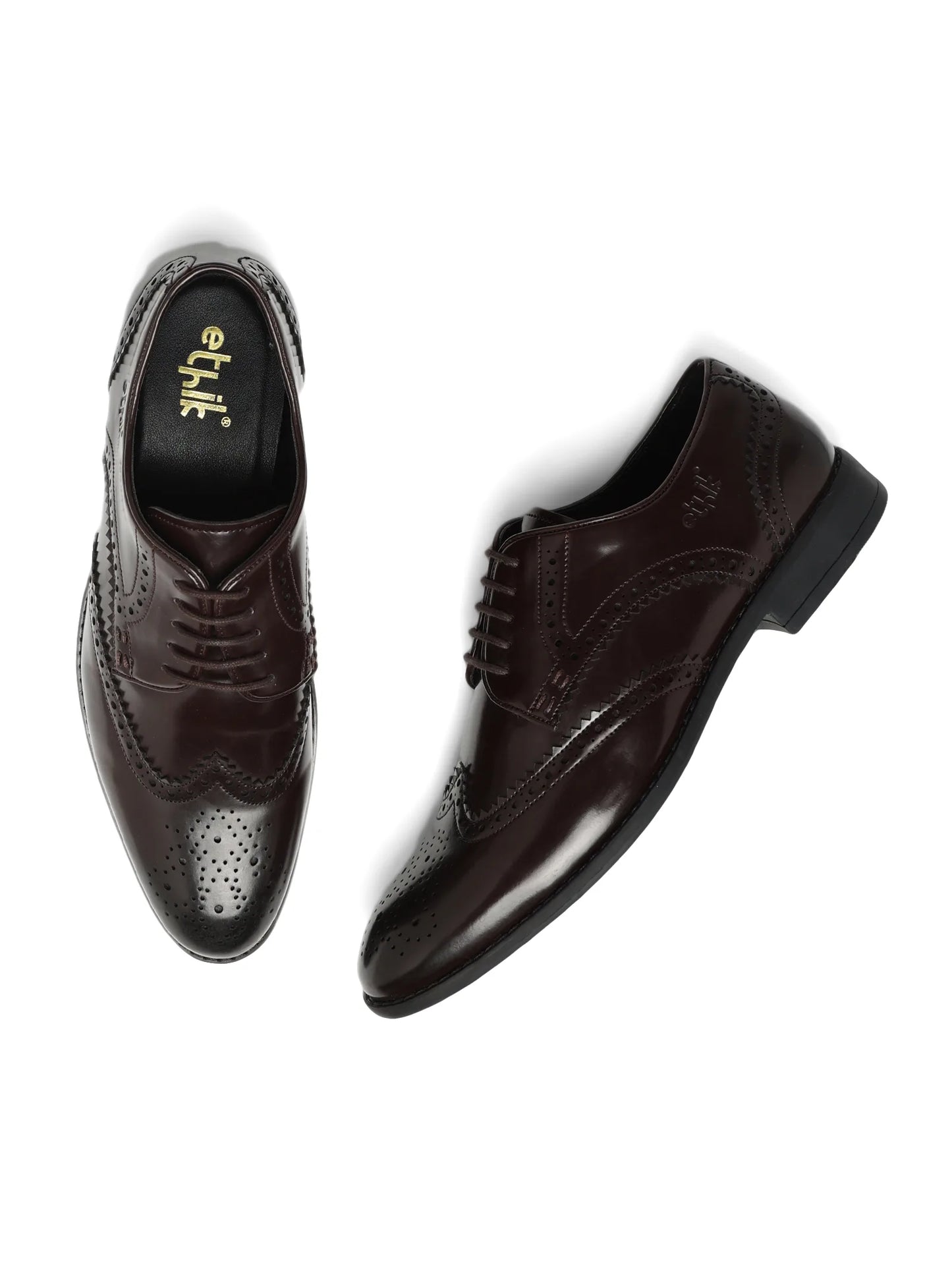 Pair of dark brown dress shoes with 'etik' branding on a white background