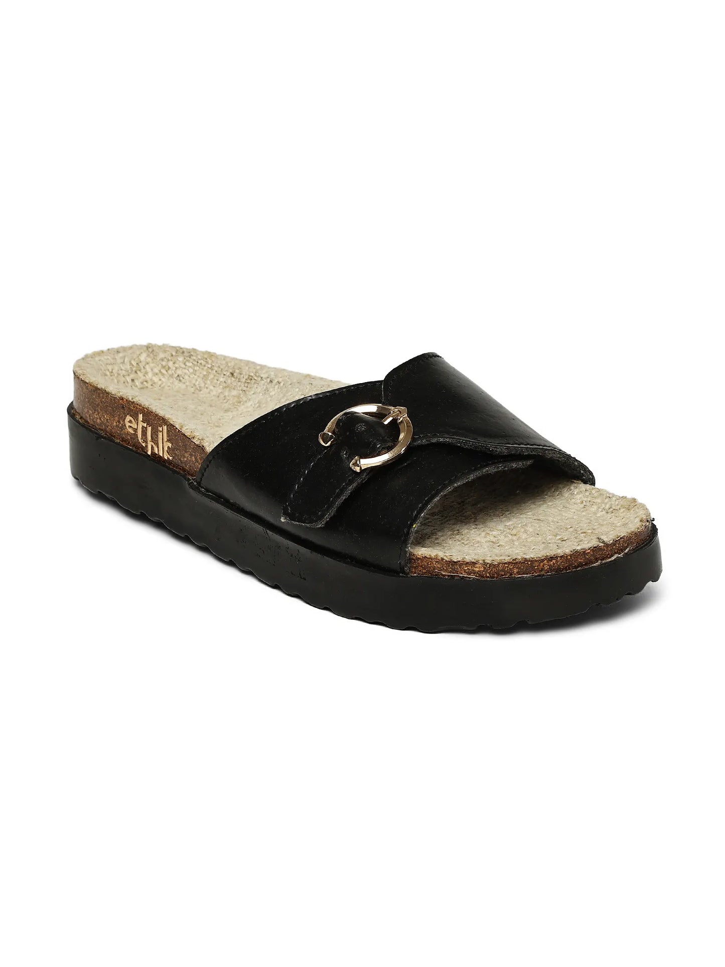 Black sandal with cork sole on a white background