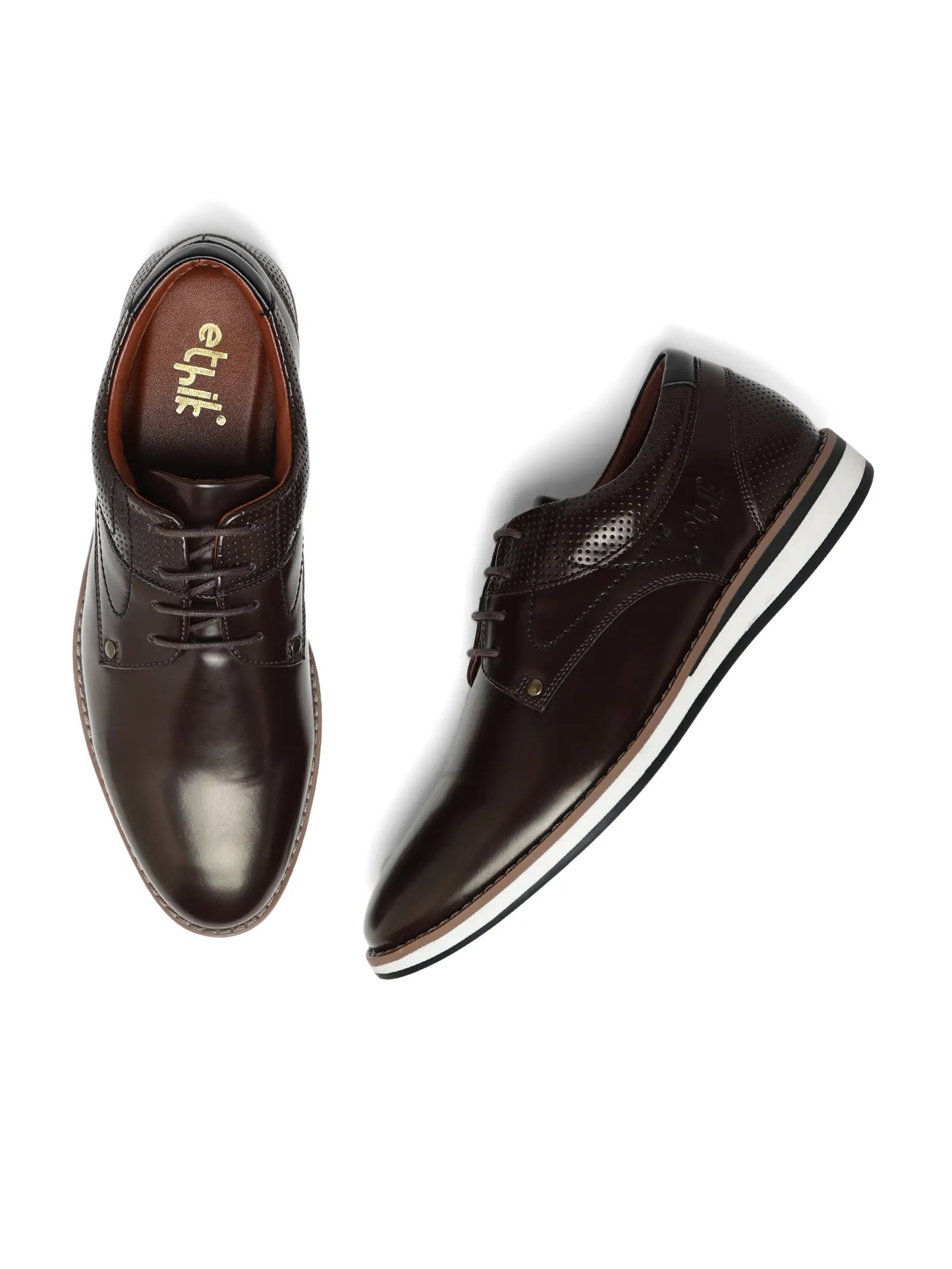 Pair of brown dress shoes on a white background