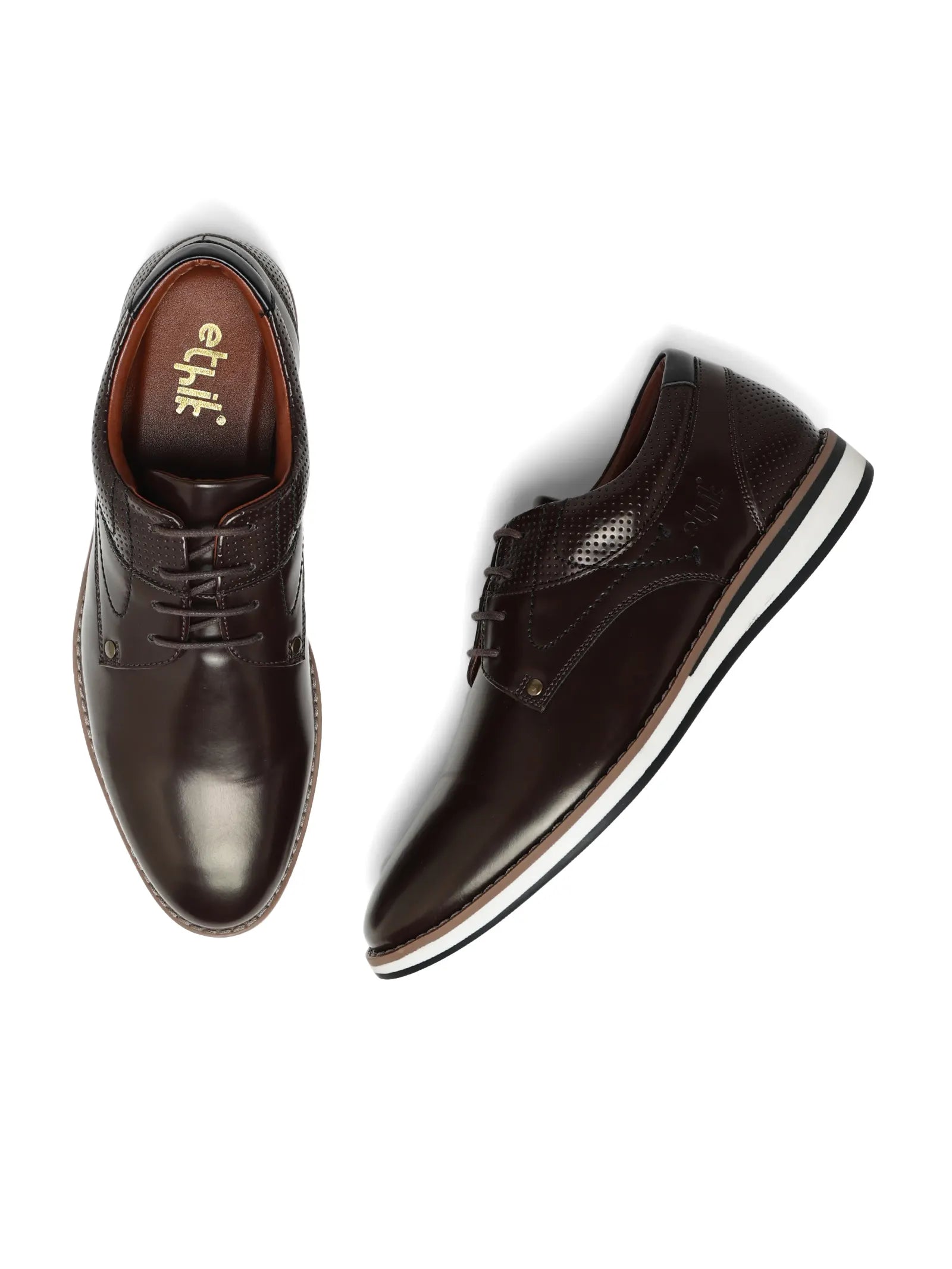 Pair of brown dress shoes on a white background